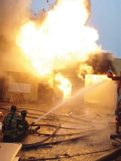 FORT WAYNE, IN &ndash; JAN. 12, 2012: Forty firefighters fought a blaze in an auto-parts shop with leaking auto fuel lighting off and propane tanks exploding. The fire was extinguished with no injuries. Hazmat operations were set up to control leaking fuel runoff into city sewers and streets.
