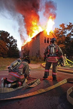 BUFFALO, NY, JULY 5, 2011 &ndash; Firefighters prepare to attack an early-morning working fire in a 2&frac12;-story wood-frame vacant building. Photo by John Hanley