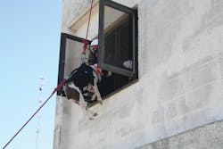 The line the rigger is handling is the top safety line, the center line is the main haul line and the line at center is the tag line. The line the rigger is handling is the top safety line, the center line is the main haul line and the line at center is the tag line.