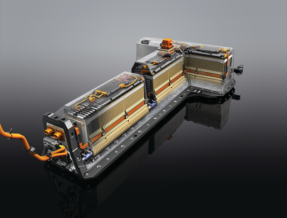 The cut-away view of the high-voltage, lithium-ion battery used in the Chevrolet VOLT clearly shows the components of this 360-volt unit. Electrical connections are on the front and top of the battery. Lower, blue connections are part of the liquid coolant circulating system.