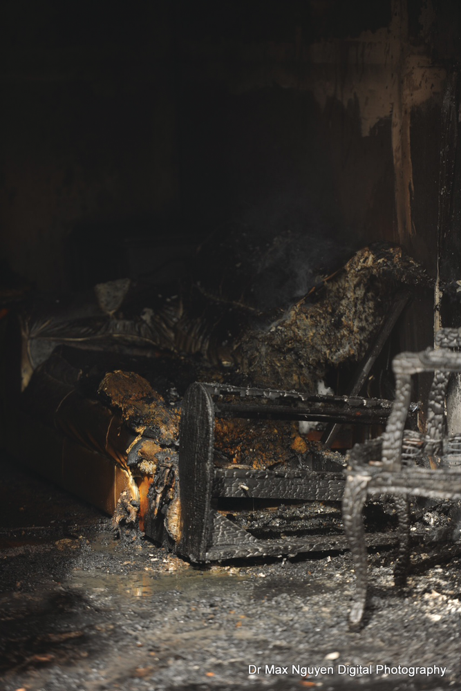 Training included firefighters aggressively attacking a live, controlled burning cell followed by a demonstration of evidence recovery and a review of fire dynamics.