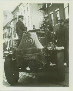The 1930 photo shows members of Baltimore City, MD, Fire Department Engine 3 in front of their quarters on Lombard Street.