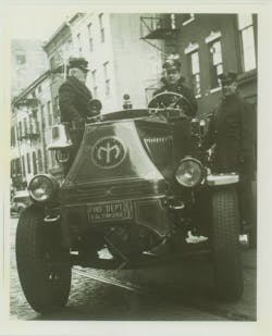 The 1930 photo shows members of Baltimore City, MD, Fire Department Engine 3 in front of their quarters on Lombard Street.