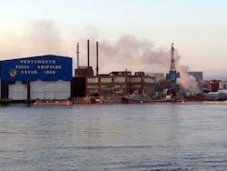 A fire burns on a nuclear submarine at the Portsmouth Naval Shipyard in Kittery, Maine on May 23.