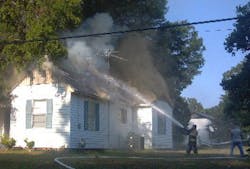 Four firefighters suffered from smoke inhalation and heat exhaustion following a blaze at a home of one of their own in Taylor on May 17.