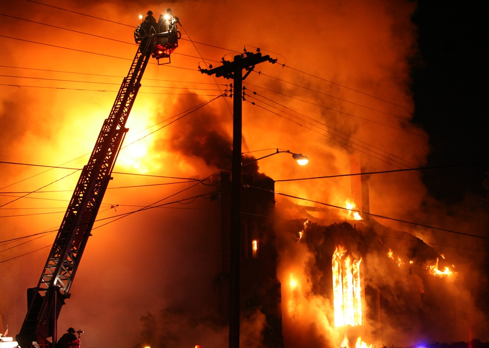 Five Minneapolis firefighters were injured while battling a blaze that destroyed the Walker Community United Methodist Church on May 28.