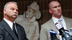 Union president Bill Gault, left, says Philadelphia Fire Commissioner Lloyd Ayers and two deputies are responsible for tactical errors made during a blaze that killed two firefighters on April 9.