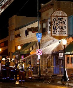 Firefighters put out a fire at the Bird Cage Saloon on historic Whiskey Row in Prescott, Ariz. on May 8.