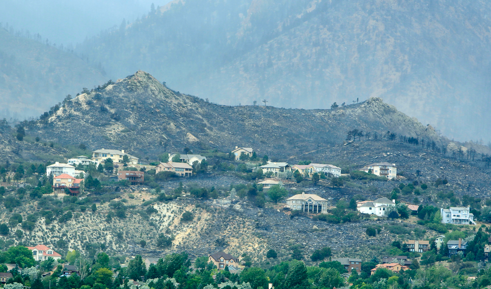 Structures in a development still stand after a wildfire burned through housing subdivisions in the mountains north and west of Colorado Springs, Colo. on June 27.