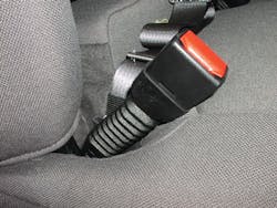 The presence of an accordian-looking sleeve below the seatbelt buckle is a good indicator that the seatbelt pretensioner system is located just below this buckle. The presence of an accordian-looking sleeve below the seatbelt buckle is a good indicator that the seatbelt pretensioner system is located just below this buckle.