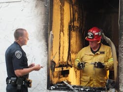 A firefighter is seen at a fire at Western Dental on June 14 that San Bernardino County fire investigators say is tied to three other fires set at other dental offices.