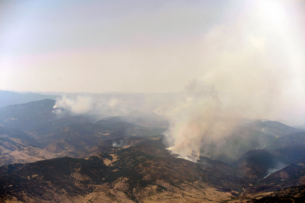Smoke plumes rise from the High Park Fire west of Fort Collins, Colo. on June 18.