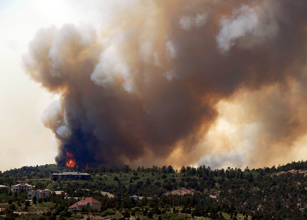 Smoke billows from a wildfire west of Colorado Springs, Colo. on June 23.