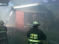 Chicago firefighters extinguished a blaze at a South Side home after an apparent natural gas explosion on July 23. Chicago firefighters extinguished a blaze at a South Side home after an apparent natural gas explosion on July 23.