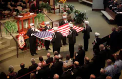 Roanoke Fire and EMS personnel fold the American flag during a memorial service for Boones Mill Firefighter/EMT John Echternach, Jr. on July 7. Roanoke Fire and EMS personnel fold the American flag during a memorial service for Boones Mill Firefighter/EMT John Echternach, Jr. on July 7.