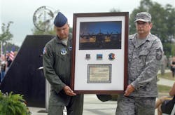 A plaque honoring four North Carolina Air National Guard airmen is unveiled during a memorial service in Charlotte, N.C. on July 10. A plaque honoring four North Carolina Air National Guard airmen is unveiled during a memorial service in Charlotte, N.C. on July 10.