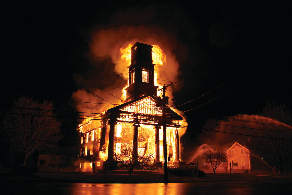 The fire rages 25 minutes after receipt of the call.