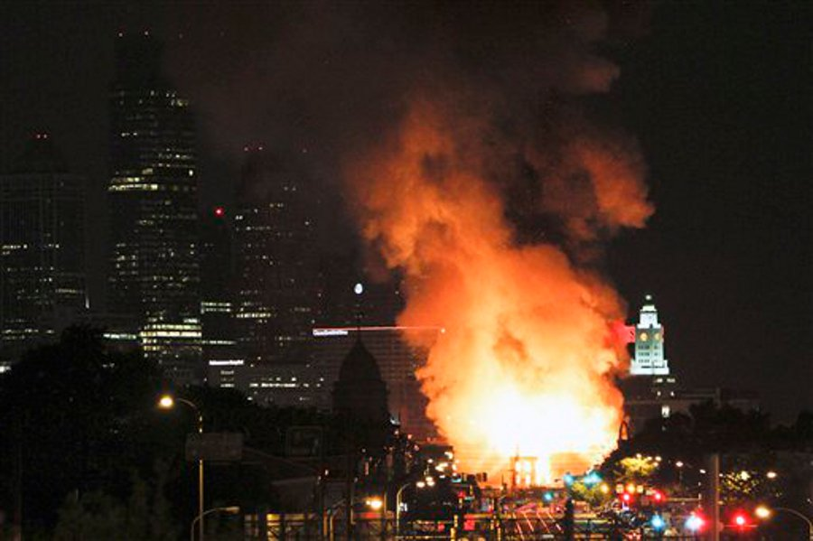 Philadelphia firefighters battle a four-alarm fire in an abandoned warehouse on July 10.