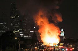 Philadelphia firefighters battle a four-alarm fire in an abandoned warehouse on July 10. Philadelphia firefighters battle a four-alarm fire in an abandoned warehouse on July 10.