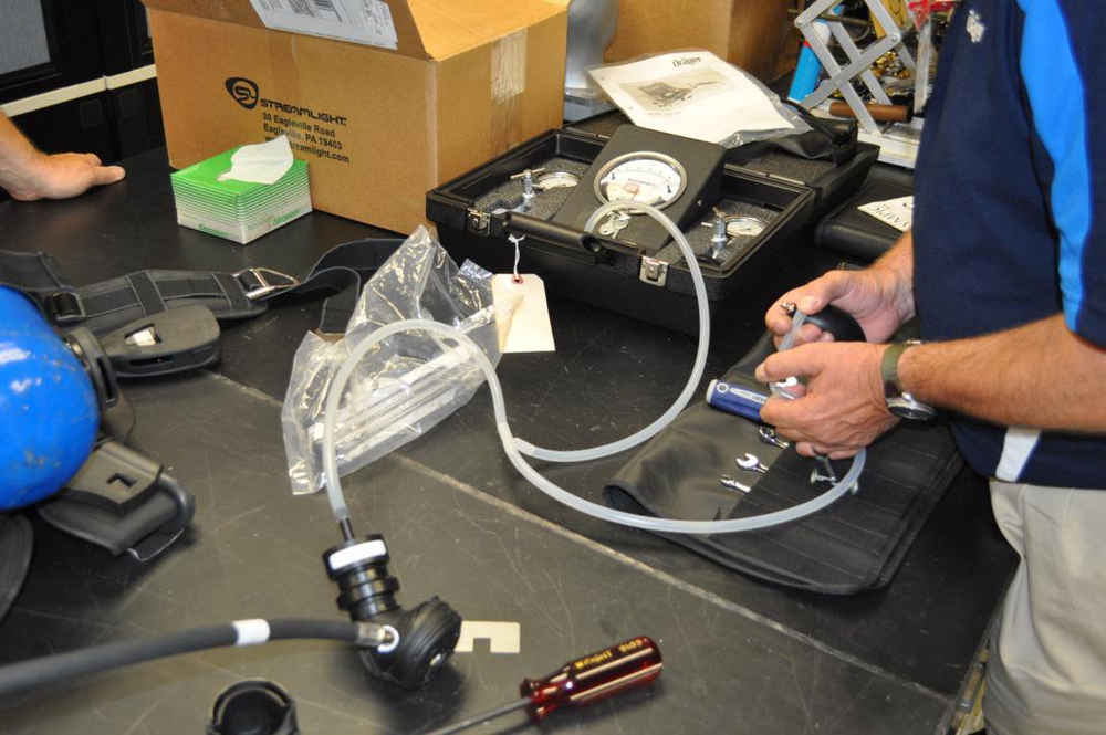 A Draeger regulator pressure test is performed prior to NIOSH testing.