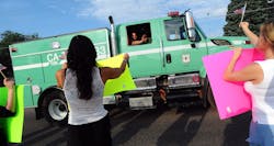 The Colorado Springs community greets firefighters at the workers' fire camp on July 3. The Colorado Springs community greets firefighters at the workers' fire camp on July 3.