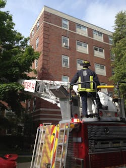 Boston firefighters disarmed a man who confronted them with a weapon at the scene of a suspected arson fire that left a woman dead Tuesday morning. Boston firefighters disarmed a man who confronted them with a weapon at the scene of a suspected arson fire that left a woman dead Tuesday morning.