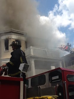 Boston firefighters battled a five-alarm blaze at a triple-decker on Aug. 16. Boston firefighters battled a five-alarm blaze at a triple-decker on Aug. 16.