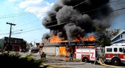 Buffalo firefighters battled a blaze at a auto repair shop and a Chinese restaurant directly across the street from a firehouse on Aug. 25. Buffalo firefighters battled a blaze at a auto repair shop and a Chinese restaurant directly across the street from a firehouse on Aug. 25.