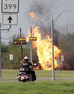 A gas line burns after it exploded on a construction site in McKinney, Texas on Aug. 28. A gas line burns after it exploded on a construction site in McKinney, Texas on Aug. 28.