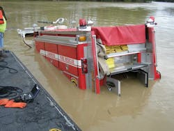 An Oakwood fire engine had to be rescued from a river after becoming submerged in the Auglaize River on Aug. 10. An Oakwood fire engine had to be rescued from a river after becoming submerged in the Auglaize River on Aug. 10.