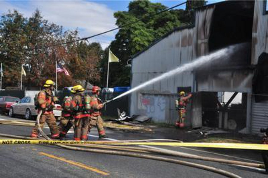 Portland firefighters battled a two-alarm fire at R and J Recycling on Aug. 21.