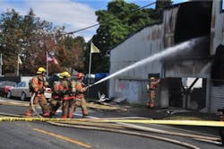 Portland firefighters battled a two-alarm fire at R and J Recycling on Aug. 21.
