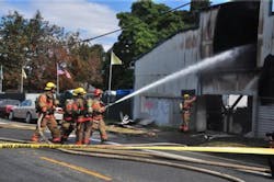 Portland firefighters battled a two-alarm fire at R and J Recycling on Aug. 21. Portland firefighters battled a two-alarm fire at R and J Recycling on Aug. 21.