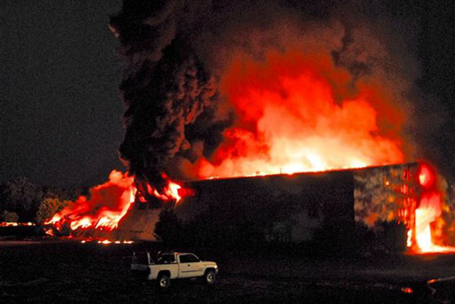 Firefighters work on a blaze at at TCI of New York, a transformer recycling company on Aug. 2 in West Ghent, N.Y.