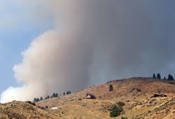 The Karney Fire burns behind the Wilderness Ranch subdivision on Spet. 18 in Boise County, Idaho.