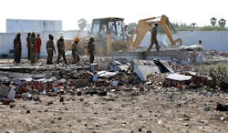 Firefighters look for victims in the rubble of the Om Siva Shakti fireworks factory on Sept. 6. Firefighters look for victims in the rubble of the Om Siva Shakti fireworks factory on Sept. 6.