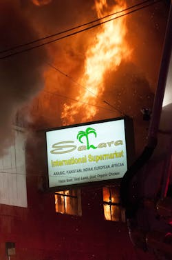 A three-alarm fire tore through the Sahara International Supermarket in Manchester, N.H. on Sept. 16. A three-alarm fire tore through the Sahara International Supermarket in Manchester, N.H. on Sept. 16.