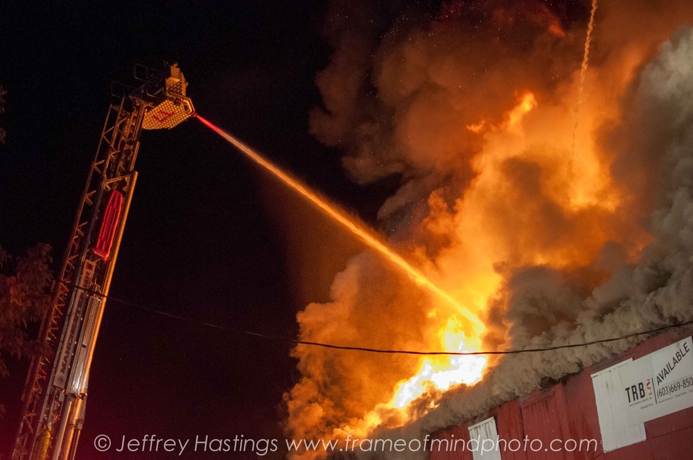 A three-alarm fire tore through the Sahara International Supermarket in Manchester, N.H. on Sept. 16.