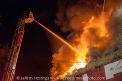 A three-alarm fire tore through the Sahara International Supermarket in Manchester, N.H. on Sept. 16. A three-alarm fire tore through the Sahara International Supermarket in Manchester, N.H. on Sept. 16.