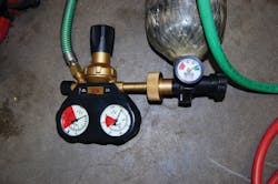 Photo 1: This pressure regulator has high- and low-pressure gauges that read the pressure in the air supply source, such as a 4,500 psi SCBA.