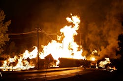 A car at is seen engulfed in flames from rail cars loaded with ethanol that derailed in Rockford, Ill. on June 19, 2009. A car at is seen engulfed in flames from rail cars loaded with ethanol that derailed in Rockford, Ill. on June 19, 2009.