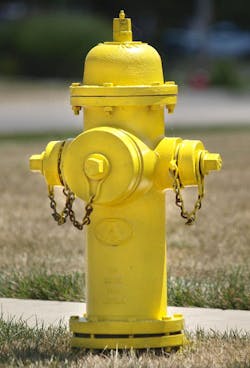 An anachronism, the three-port hydrant, designed in the late 1800s for firefighting as it was done then, not as it is done now.