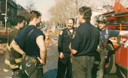 FDNY Firefighters John Florio (left) and Carl Bedigian (right) after a vacant building fire in 1996.