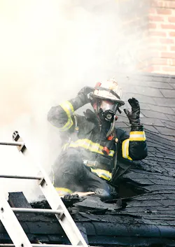 Roslyn Rescue Fire Company Assistant Chief Tommy Langone takes a break following a building fire in July 2000. He responded with NYPD Emergency Services Unit Truck 10 to the terrorist attacks and never came home.