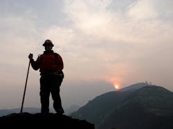 A firefighter is seen digging a fire line at the Sheep Fire in the Nez Perce National Forest on Sept. 16.