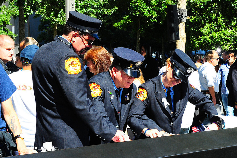 FDNY firefighters are seen at the 9/11 memorial on Sept. 11, 2012.