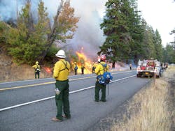 Firefighters are seen performing burnout operations along Highway 12 during the Yakima Complex Fire. Firefighters are seen performing burnout operations along Highway 12 during the Yakima Complex Fire.