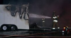 Members of the Northwest Fire District battled a fire after a trailer full of Poore Brothers chips caught fire on Oct. 18. Members of the Northwest Fire District battled a fire after a trailer full of Poore Brothers chips caught fire on Oct. 18.