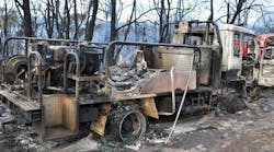 Austrian firefighters battling a wildfire became trapped in their apparatus on Oct. 12 after it became engulfed in flames.
