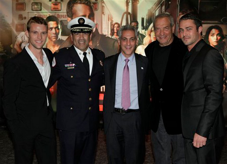 From left, actor Jesse Spencer, Chicago Fire Commissioner Jose Santiago, Chicago Mayor Rahm Emanuel, Executive Producer Dick Wolf and actor Taylor Kinney are seen at the premiere of 'Chicago Fire' at the Chicago History Museum on Oct. 2.